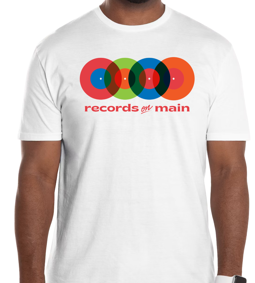 White t-shirt with colorful vinyl record design and 'records on main' text